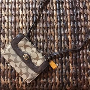 Brown Coach wallet/purse with long shoulder strap